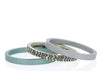 ​pack de 3 medium, un medium de plata "zigzag" y dos mediums de aluminio anodizado, color a elegir.